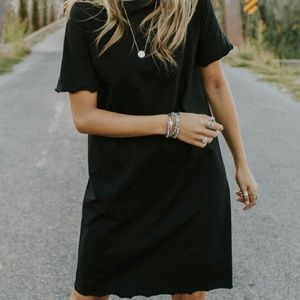 Roolee T-shirt Dress in Black with ruffle hem